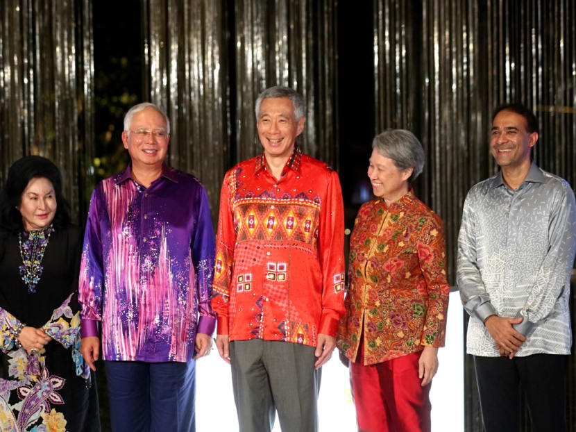 (From left) Group photo of Mdm Rosmah Mansor, Malaysian Prime Minister Najib Razak, Singapore Prime Minister Lee Hsien Loong, Mrs Lee, and Mr Azman Yahya, Chairman of Board of Directors, M+S at the official opening of Marina One and DUO Developments on Jan 15, 2018. Photo: Nuria Ling/TODAY