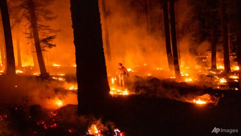 California wildfire flares but within line crews have built