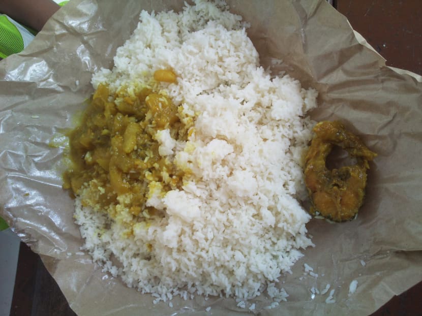 An ongoing study has highlighted poor nutrition and handling of meals catered for foreign workers by employers. Researchers found that the meals, usually a pile of rice and some tinned meat or curry, are also often prepared hours in advance and sit uneaten until lunch. Photo: Banglar Kantha
