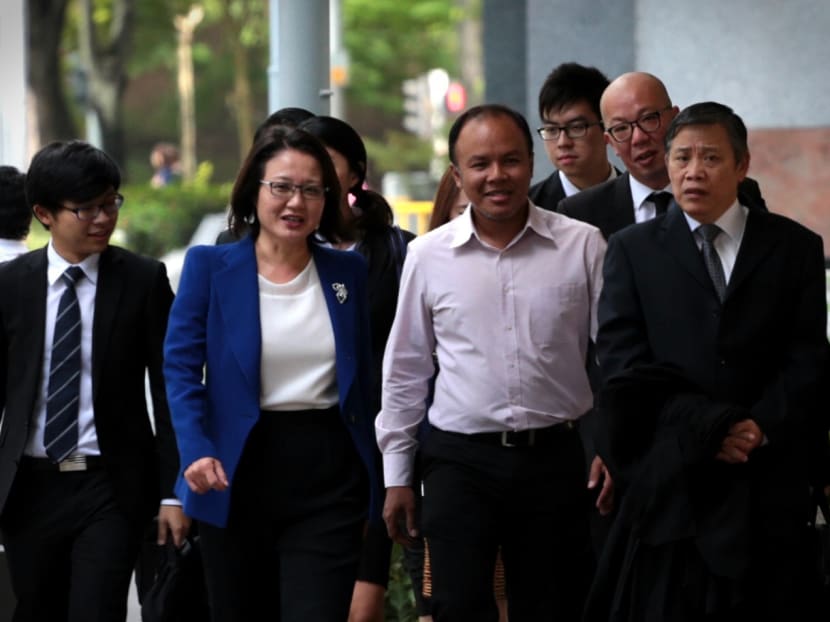 Ms Sylvia Lim and Mr Muhd Faisal enter the Supreme Court on May 4, 2015. Photo: Jason Quah