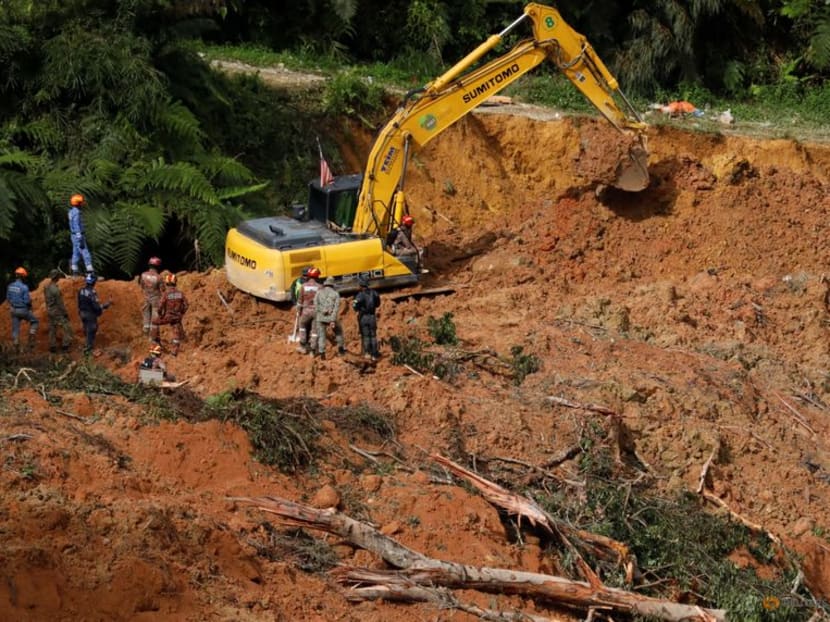 FILE PHOTO: Rescuers work during a rescue and evacuation operation following a landslide at a campsite in Batang Kali, Selangor, Malaysia, December 17, 2022. REUTERS/Hasnoor Hussain