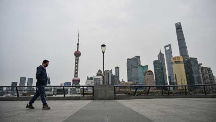 China's Shanghai split in two for COVID-19 lockdown as asymptomatic cases surge