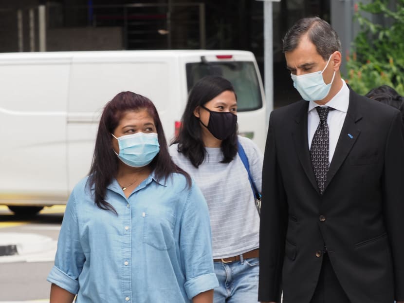 Ms Parti Liyani (left) and her lawyer Anil Balchandani (right) outside the State Courts on Sept 8, 2020.