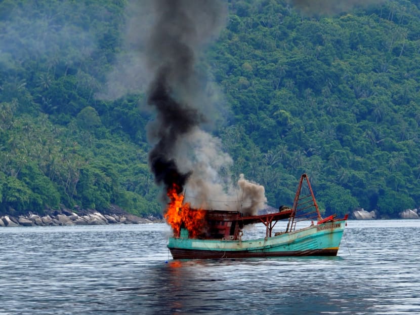 A Vietnamese fishing boat in flames after Indonesian Navy officers blew up the vessel due to illegal fishing activities in the remote Anambas Islands. AFP file photo