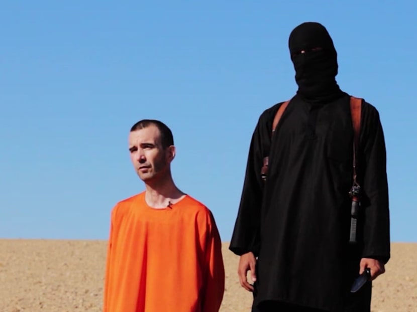 This image made from a video posted on the Internet by Islamic State militants and provided by the SITE Intelligence Group, on Sept 13, purports to show British aid worker David Haines before he was beheaded.  Photo: AP