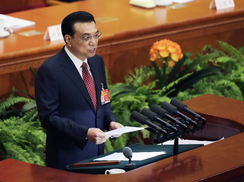 Chinese Premier Li Keqiang delivers a work report during the opening session of the National People's Congress at the Great Hall of the People in Beijing in this March 5, 2015 file photo. Photo: AP