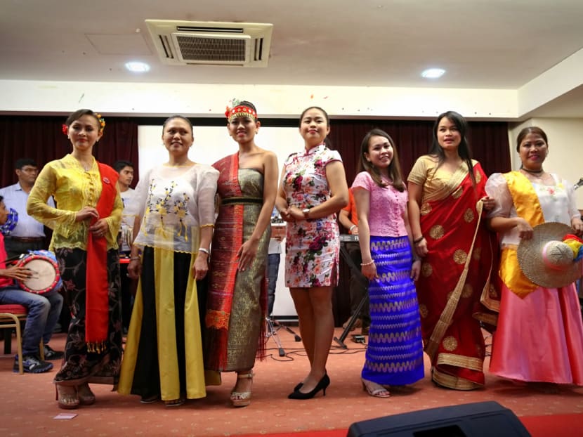 Migrant workers from countries like Bangladesh, Philippines and Indonesia put on performances to foster friendship amongst different cultures. Domestic helpers put up a fashion show wearing traditional costumes. Photo: Nuria Ling/TODAY