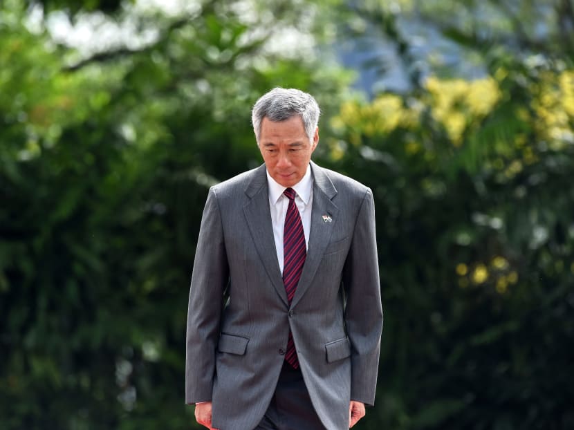 This photograph taken on June 2, 2017 shows Prime Minister Lee Hsien Loong at an event at the Istana presidential palace in Singapore. A feud between the children of Singapore's late founding leader intensified on June 14, 2017 after two siblings publicly accused their brother PM Lee of disobeying their father's last wishes and abusing his powers. Photo: AFP