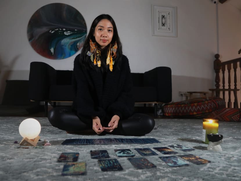Ms Elaine Mok, 21, a first-year university student and part-time tarot card reader.