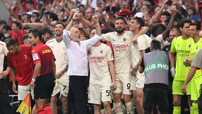 AC Milan win first Serie A title in 11 years after final-day victory at Sassuolo