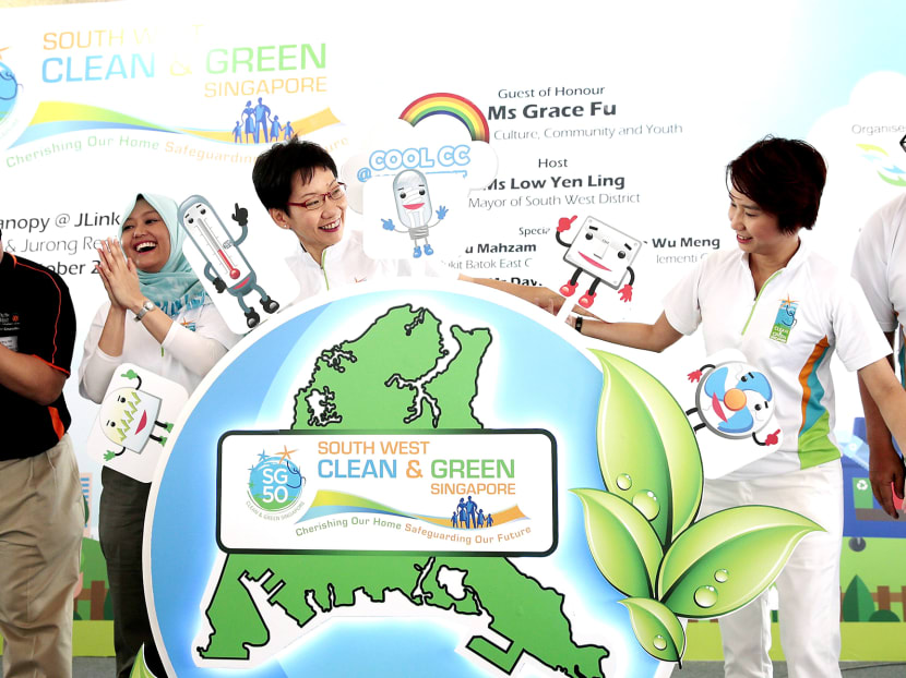 (From left) Ms Rahayu Mahzam, Ms Grace Fu, Ms Low Yen Ling, and Mr David Ong at the South West Clean and Green SG50 Carnival, where the Cool CCs programme, aimed at inculcating green habits, was launched. Photo: Jason Quah