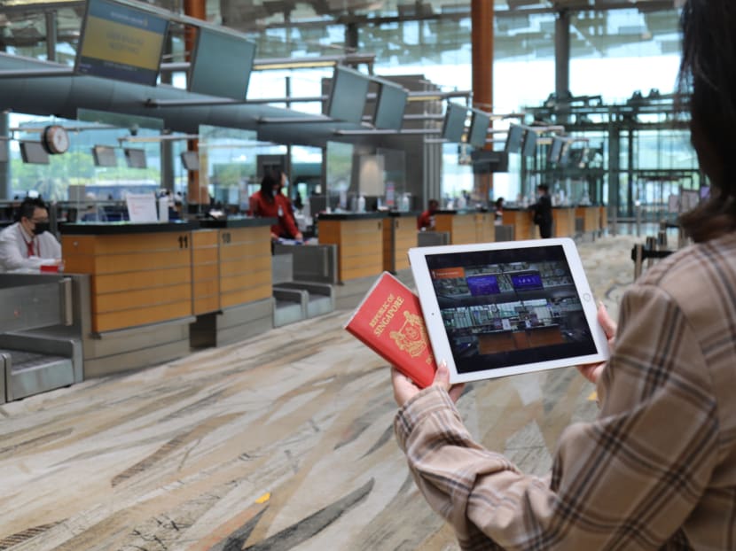 A passenger using Changi Airport's social story tool during check-in. A passenger using Changi Airport's social story tool during check-in.