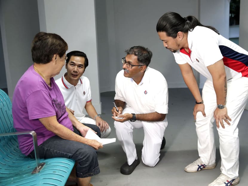 PAP's Murali Pillai with a resident during a walkabout in Bukit Batok on April 28, 2016. Photo: Wee Teck Hian/TODAY