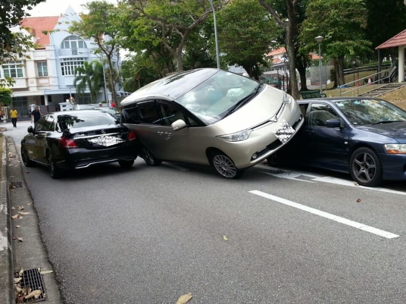 Accident at Chuan Drive causes MPV to tilt