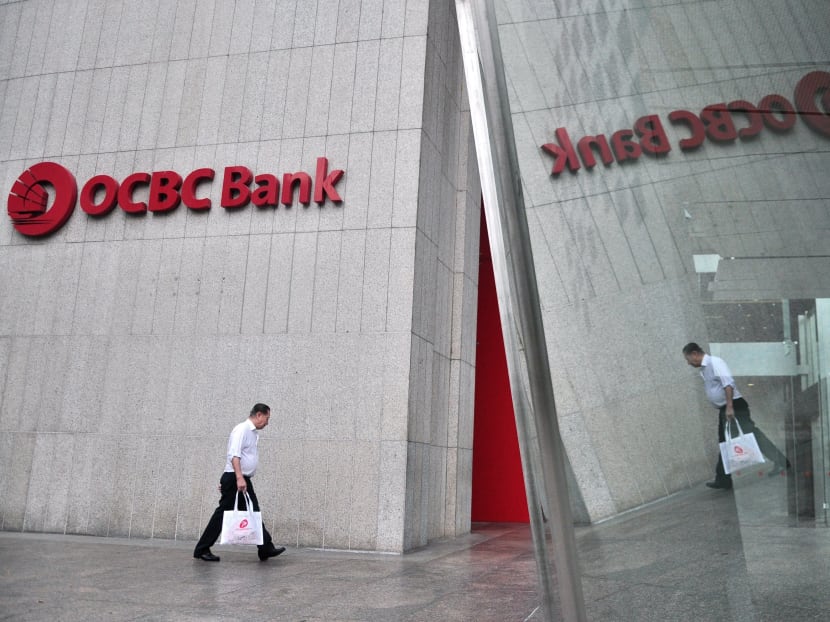 Charges for soured oil and gas loans also dragged on OCBC's earnings in the second quarter, when it reported a  15 per cent profit decline. Photo: AFP