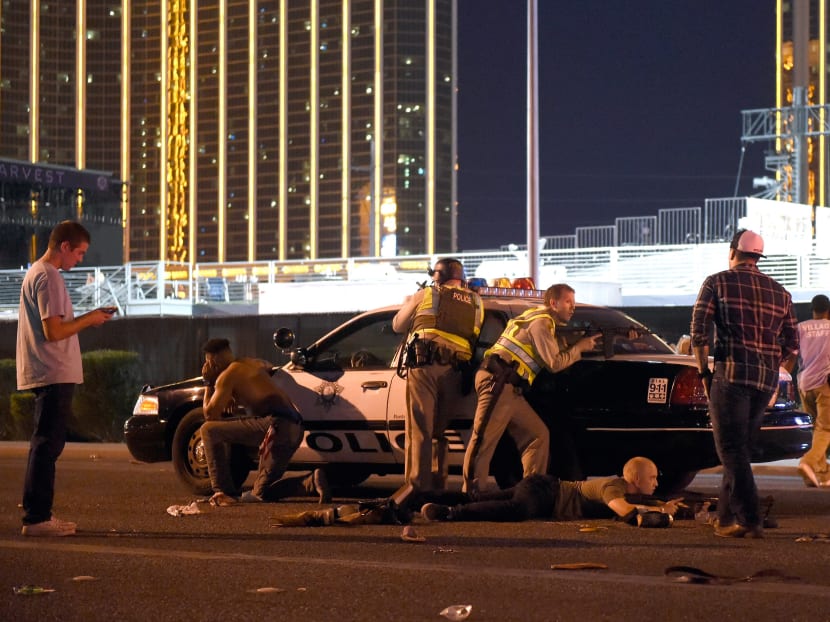 Las Vegas police stand guard along the streets outside the the Route 91 Harvest country music festival grounds after a active shooter was reported on October 1 in Las Vegas, Nevada. There are reports of an active shooter around the Mandalay Bay Resort and Casino. Photo: AFP