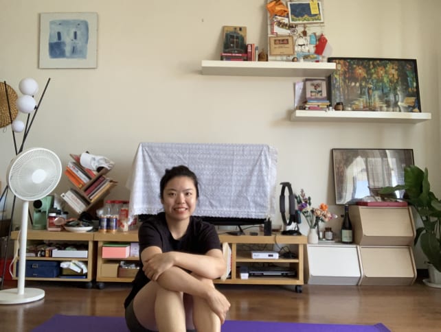 The author is seen here in her apartment in Beijing. She works in advertising in the Chinese capital. 