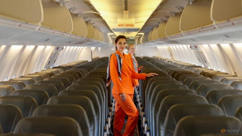 Ukrainian airline ditches skirts and heels for loose suits and sneakers Ukrainian airline ditches skirts and heels for loose suits and sneakers