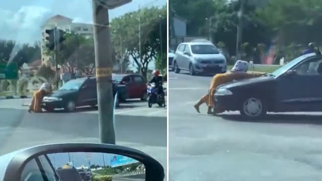 马国妇女人肉挡车视频疯传 警方寻当事人助查  