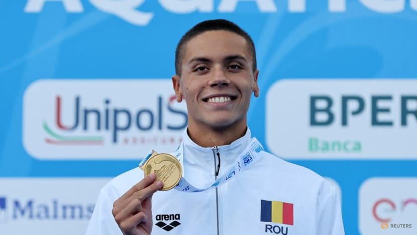 Romania's Popovici breaks world 100m freestyle record at European championships