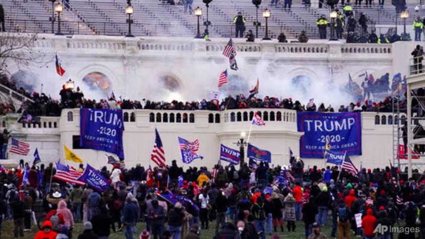 US intel report warns of more violence by QAnon followers US intel report warns of more violence by QAnon followers