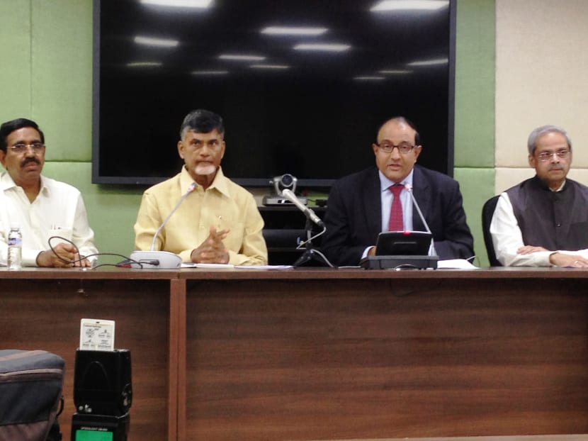 Andhra Pradesh's Chief Minister Chandrababu Naidu (second left) with Second Minister for Trade and Industry S Iswaran. Photo: Lee Yen Nee