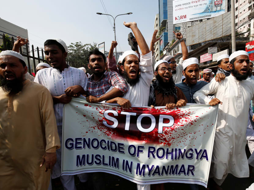 File photo of Bangladeshi activists of an Islamic group protesting against the deaths of the Rohingya people in the Rakhine state of Myanmar on Dec 1. Photo: Reuters