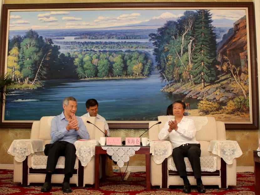 Mr Lee Hsien Loong meeting Urumqi Party Secretary Mr Zhu Hailun in Xinjiang yesterday. Photo: MCI