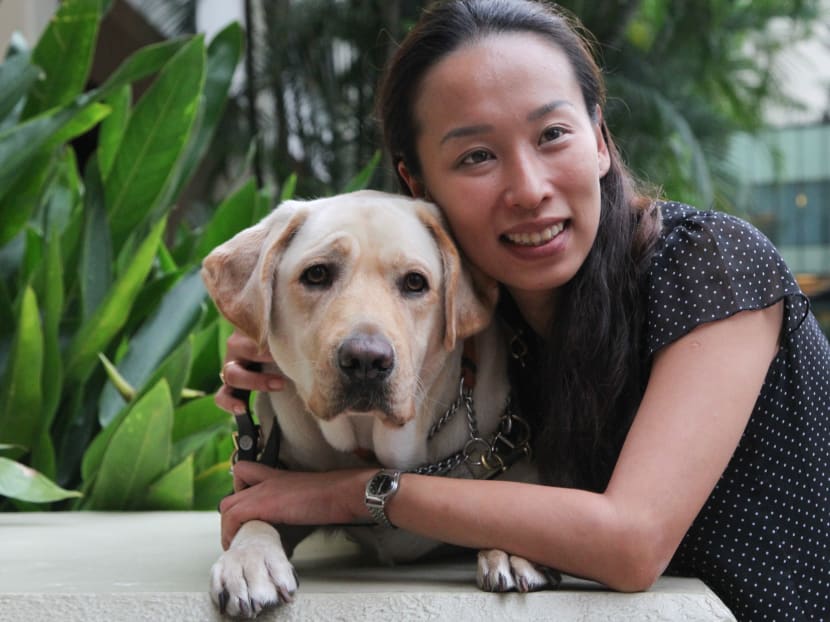 Cassandra Chiu and her guide dog Esme. Photo: Don Wong