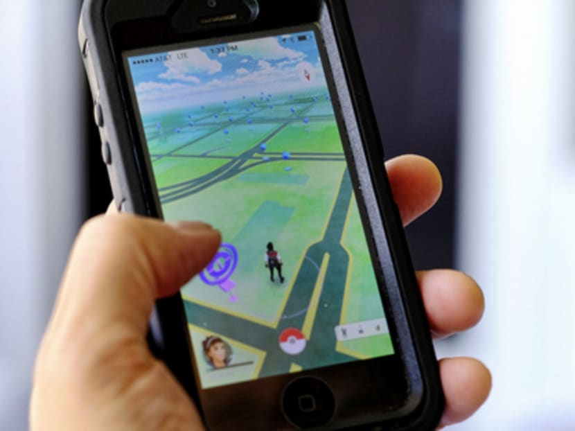 Just days after being made available in the United States, the mobile game Pokemon Go has become the top-grossing app in the App Store. While it is free to download, it could monetise on its success through in-app purchases. Photo: AP