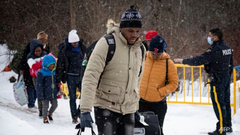 US to review migrants abroad, toughen penalties in revamp