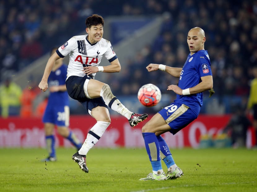 Tottenham's Son Heung Min in action with Leicester City's Yohan Benalouane. Photo: Reuters