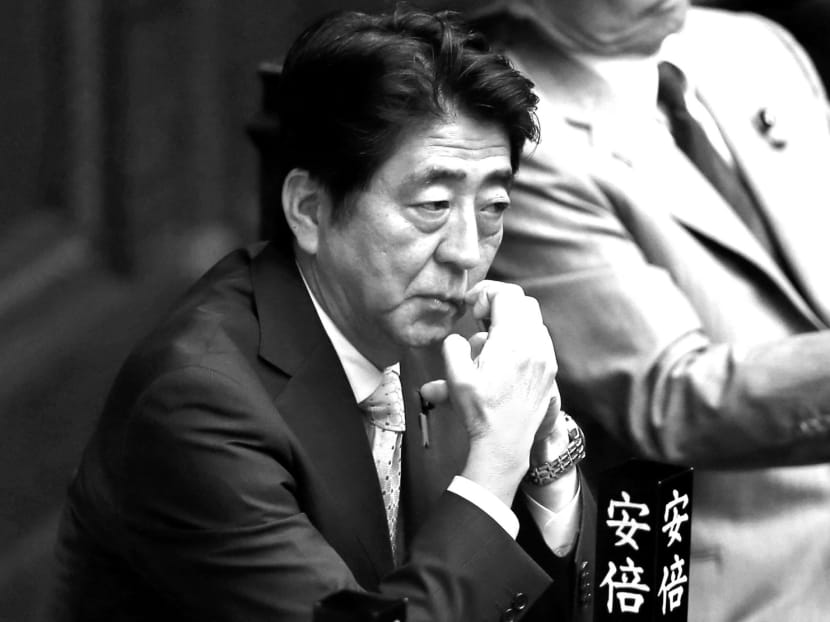 Japanese Prime Minister Shinzo Abe at a Lower House plenary session in Tokyo on July 16. Like former Premier Nobusuke Kishi, Mr Abe is a conviction politician who will ignore public opinion if he has to. Photo: AP