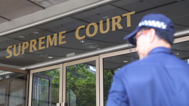 涉为跨国诈骗集团洗钱 在马国落网的本地男子被控