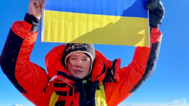 Ukrainian flag on summit of Everest
