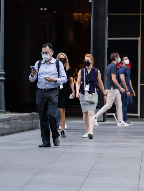 Office workers in Singapore's Central Business District. Office workers in Singapore's Central Business District.