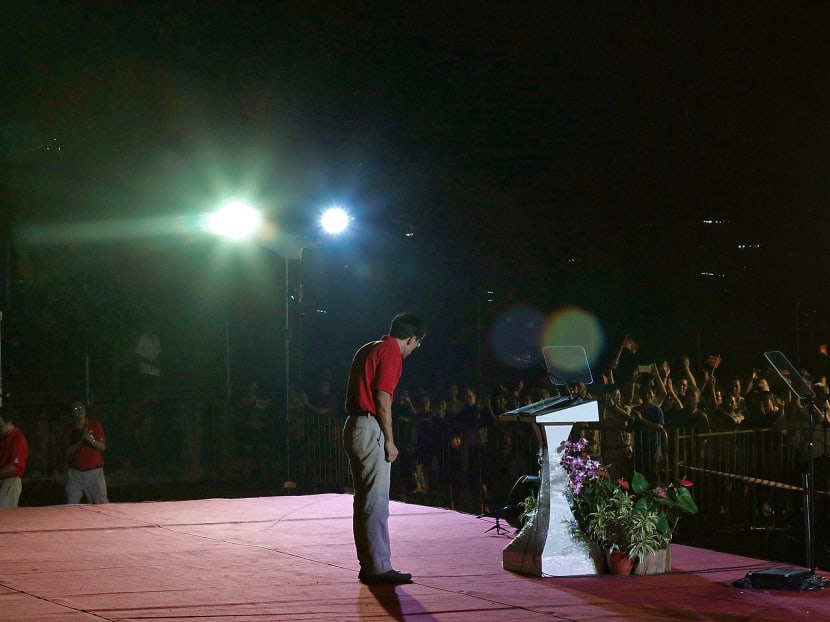 Singapore Democratic Party chief Chee Soon Juan bows during an election rally last Friday. Dr Chee maintains that the substance of what he has said in the past and now has not changed. Photo: Jason Quah