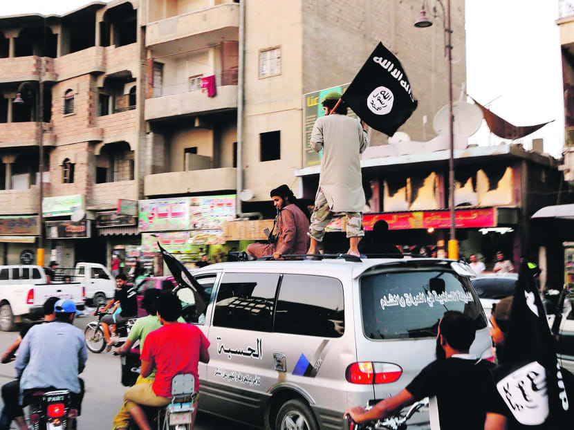Following the group’s announcement on Sunday, Islamic State fighters in their northern Syrian stronghold of Raqqa paraded through the city to celebrate. Video of the celebrations was posted online and activists in the city confirmed the details. PHOTO: REUTERS