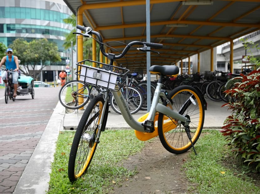Wong Swee Liang used the shared bicycle to shuttle between his office and an MRT station, and wanted to stop Land Transport Authority enforcement officers from seizing it.