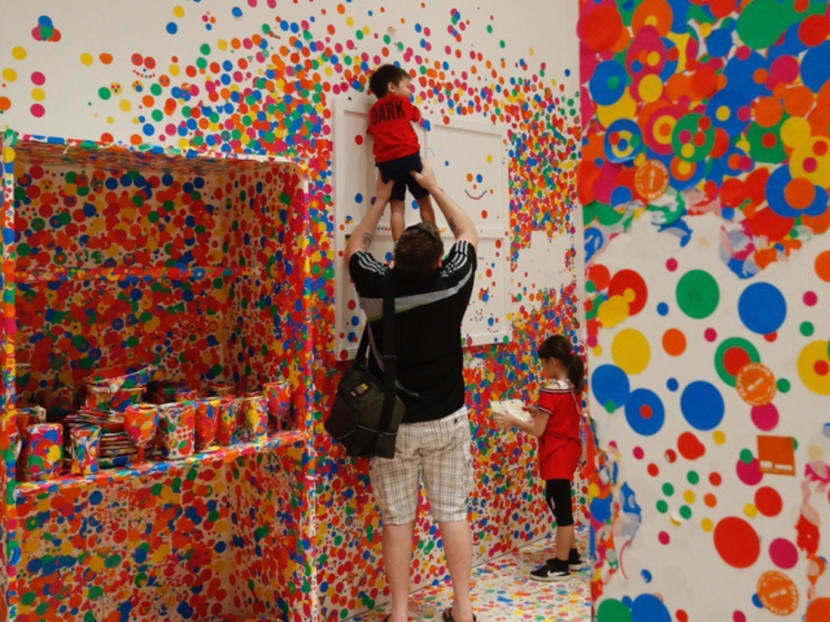Visitors at the Obliteration Room exhibit at the National Gallery Singapore, where artworks by PCF Sparkletots children were showcased, during the PCF Family Day on Aug 27, 2017. Photo: Najeer Yusof/TODAY