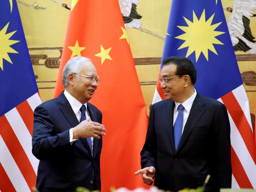 Malaysia's Prime Minister Najib Razak and China's Premier Li Keqiang attend a signing ceremony at the Great Hall of the People, in Beijing, China, November 1, 2016. Photo: Reuters