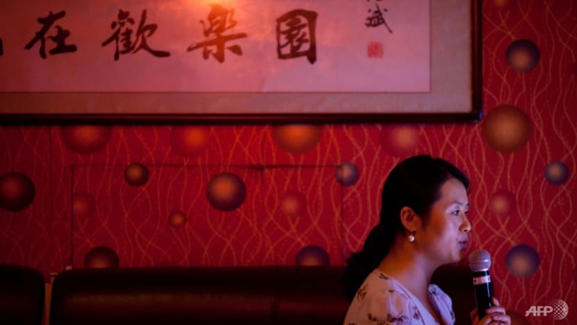 China to ban karaoke songs deemed 'national security' threats China to ban karaoke songs deemed 'national security' threats