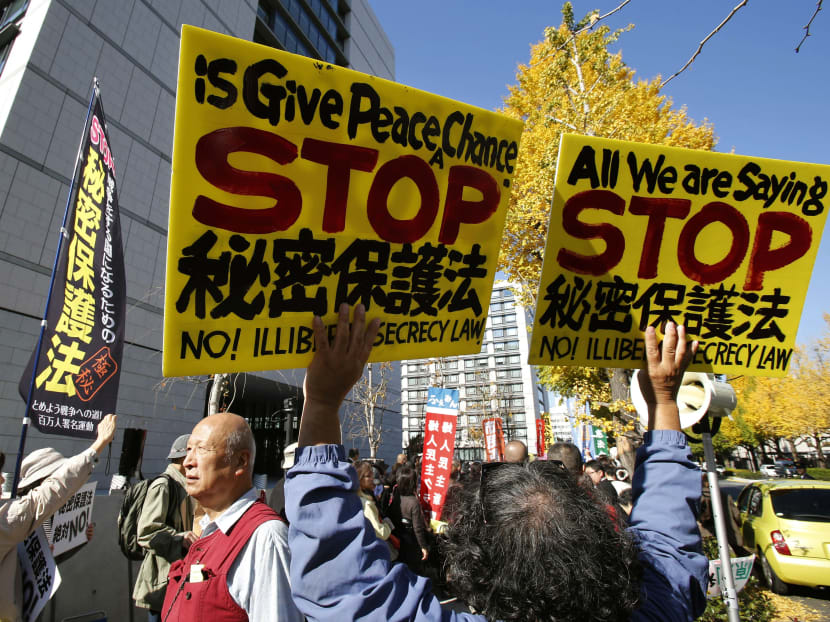 Demonstrators protesting against the Designated Secrets Bill in front of parliament of Japan in Tokyo. Photo: AP