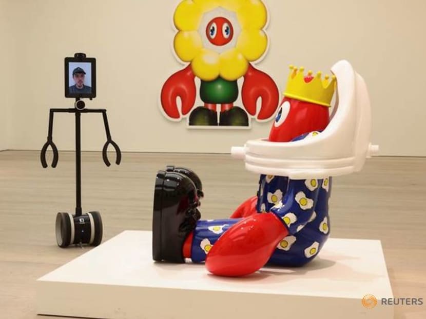 Robots get private view of major pop art show Robots get private view of major pop art show
