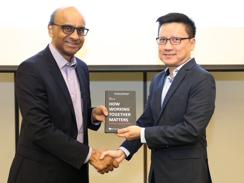 Deputy Prime Minister Tharman Shanmugaratnam (left) and Professor David Chan at the launch of the book, How Working Together Matters: Adversity, Aspiration, Action, on Nov 27, 2018.
