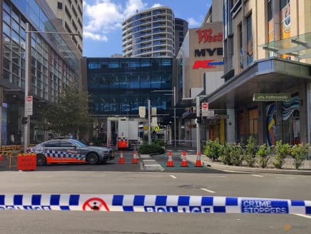 A view of a police car outside Westfield Bondi Junction as the mall remains under lockdown following Saturday’s stabbings in Sydney, Australia on April 14, 2024.