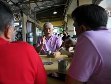 Opposition politician Goh Meng Seng speaking at a coffee shop during the 2020 General Election. 