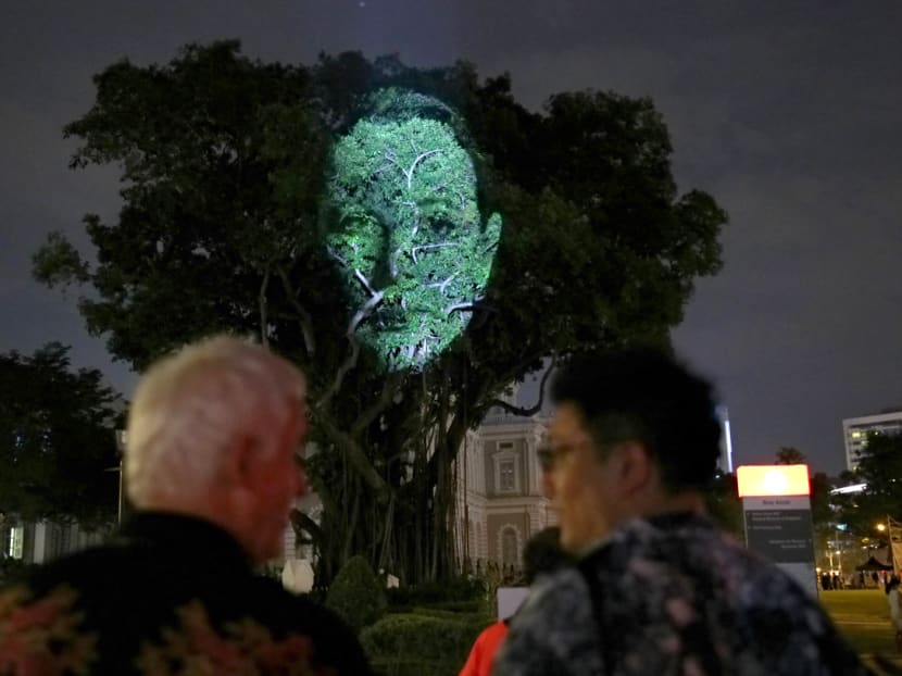Visitors to the National Museum on Wednesday (Aug 16) night would have seen the banyan tree outside wearing a face. The image is a work by British artist Karel Bata, one of a series of portraits being projected onto the banyan tree. The work toys with the notions of identity, representation and transformation and is part of the Singapore Night Festival 2017’s Night Light showcase along the Bras Basah and Bugis precinct. Photo: Nuria Ling/TODAY