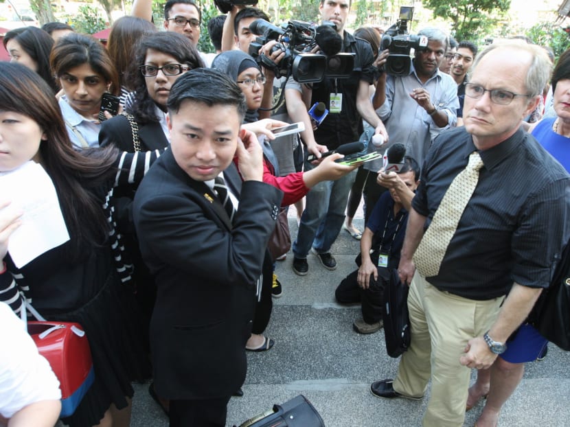 Mr Rick Todd and Mrs Mary Todd speak to the media outside of the Subordinate Courts after the first day of the coroner's inquiry into the death of their son, Shane Todd, on May 13, 2013. Photo: Don Wong