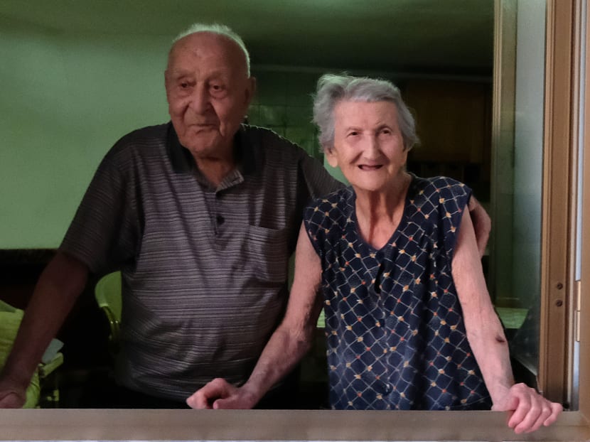 Italian Antonio Vassallo, 100 years-old, and his wife Amina Fedollo, 93, pose in their house in Acciaroli, southern Italy, on August 23, 2016. Situated on the western coast of southern Italy, the town of Acciaroli has a disproportionately high number of centenarians in its population of about 2,000. Photo: AFP